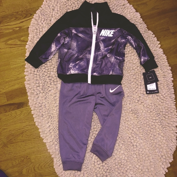 purple nike jogging suit